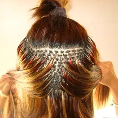 Fusion hair extensions, with the top section pinned up to show the strands